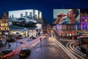 Side-by-side comparison of a high-resolution seamless digital billboard and a dot-matrix LED billboard displaying advertisements on city building facades at night.