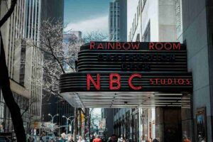 Exterior marquee sign showcasing durable materials for outdoor signs at the NBC Studios entrance.